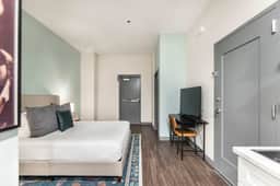 Cozy Stay Next To Atrium Hospital | Walk Score 74; Mercer Music at Capricorn – ~12-minute walk (0.6 miles) - Image 3